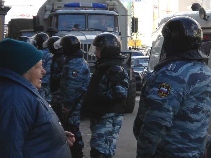 babushka confronting Omon riot police- Moscow Ap14-07